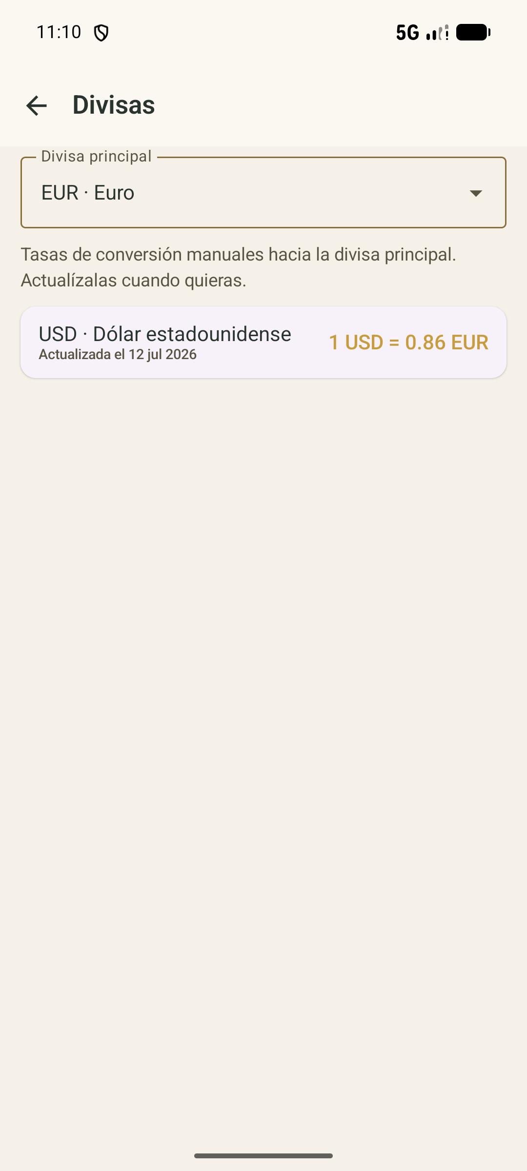 Pantalla de divisas con la tasa de conversión manual.